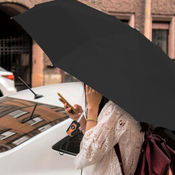 woman holding Mini Sport Auto Open & Close Foldable Umbrella